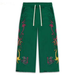 Vale Forever Green Tribal Graphic Distressed Wide Leg Sweatpants